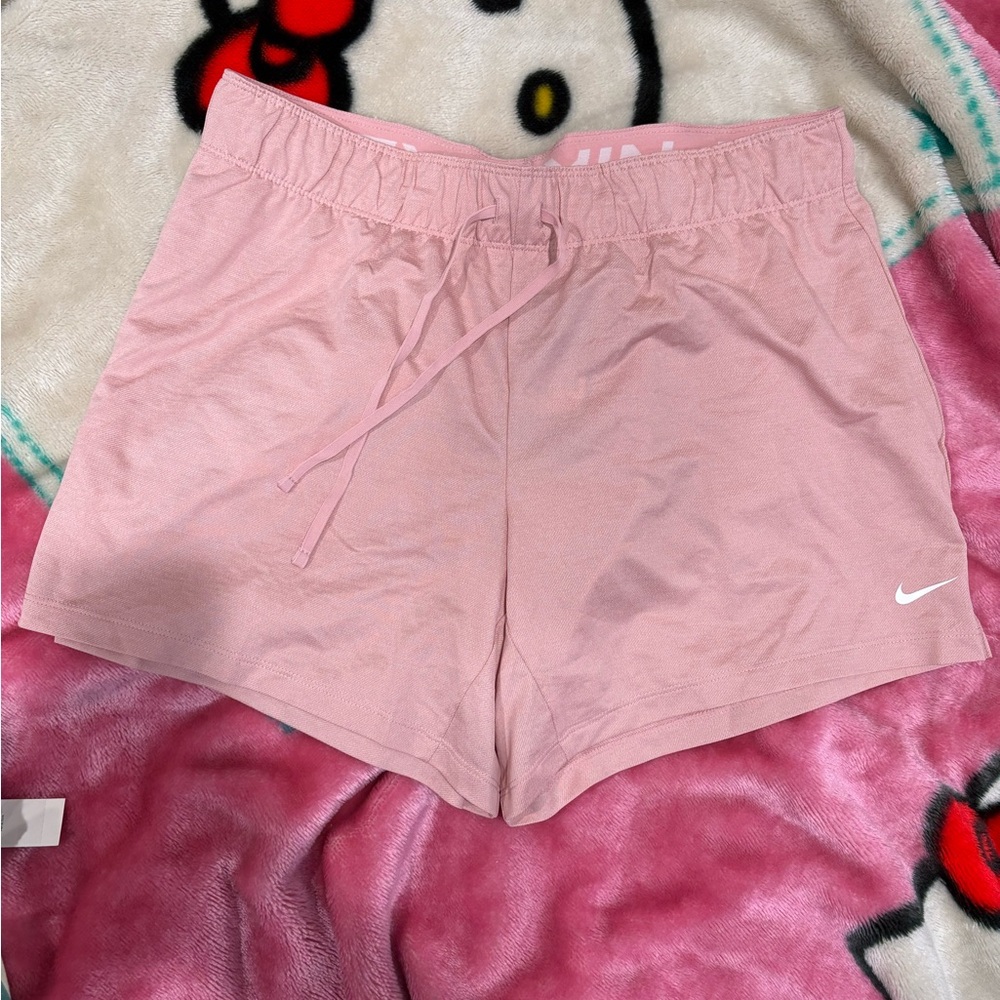 Pink Nike shorts